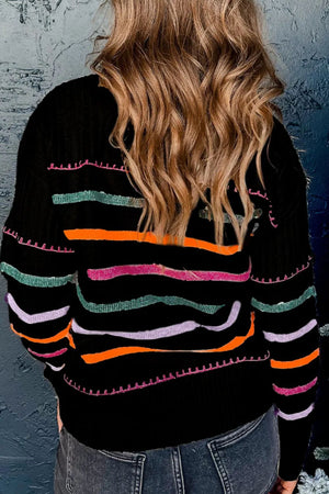 Black ribbed knit pullover sweater with colorful wavy stripe details and pink stitching.