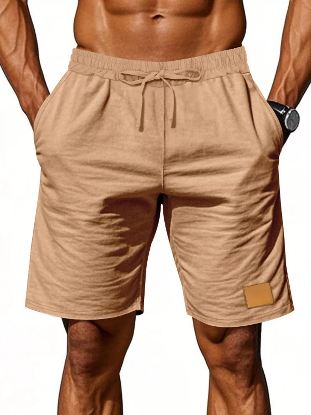 Light Khaki chino shorts with drawstring waist and side pockets, featuring a small patch detail.