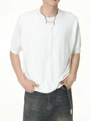 White henley t-shirt with button placket and short sleeves.