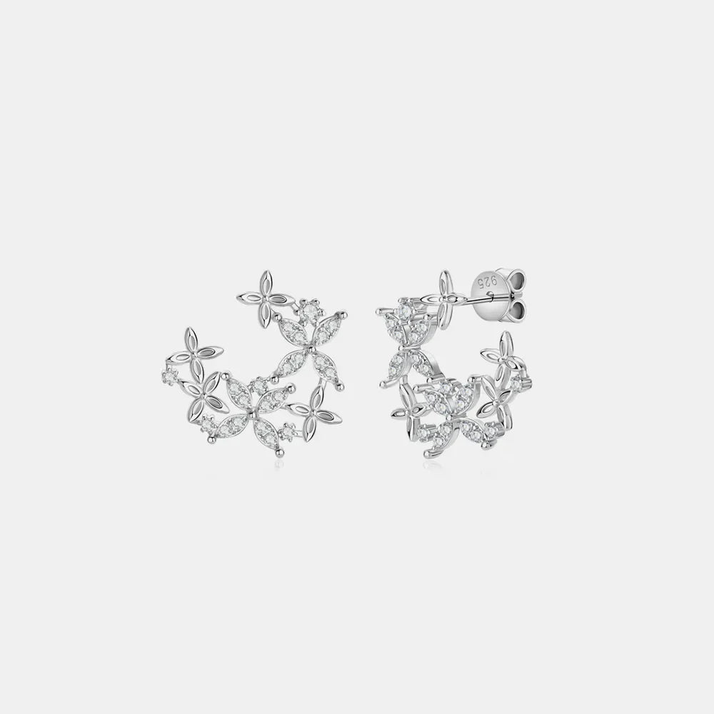 Silver floral cluster stud earrings with clear stones