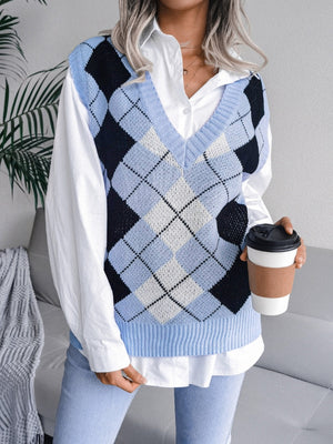 Argyle knit v-neck sweater vest in light blue, black, and white acrylic.