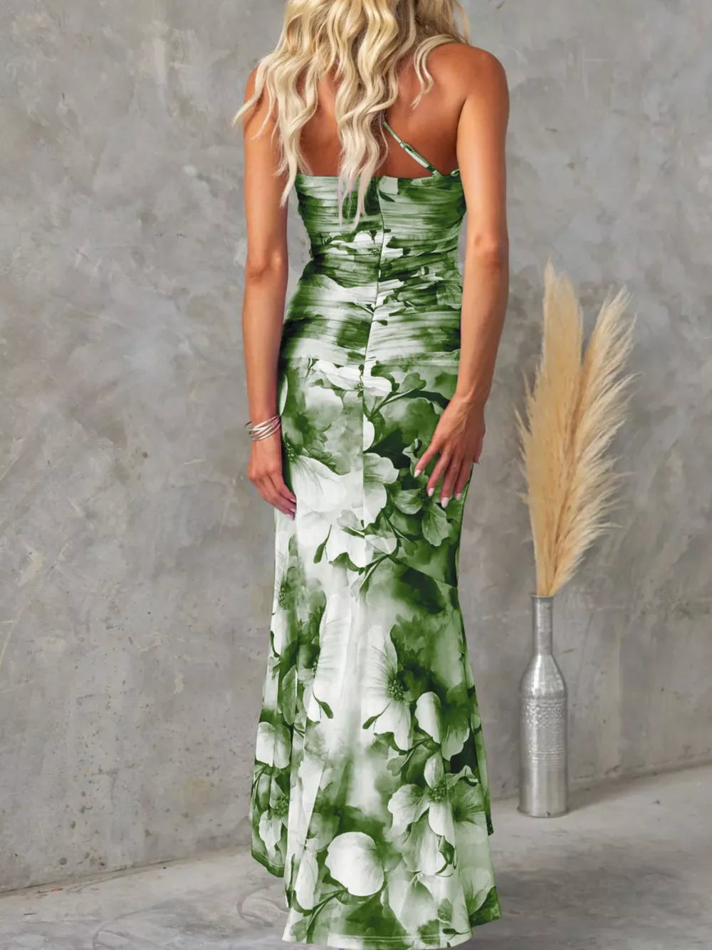 Olive green floral one-shoulder maxi dress with ruched bodice and asymmetrical neckline.