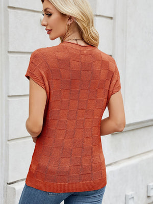 Textured knit t-shirt in burnt orange with short sleeves and a checkerboard pattern.