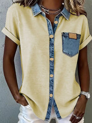 Yellow heathered short sleeve button-down maternity shirt with denim collar, placket, and chest pocket.