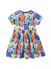 Toddler bow print a-line dress with short sleeves and gathered waist in multicolor bows on navy.