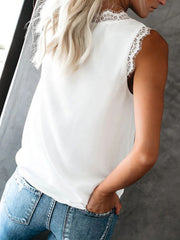 White silk cami top with lace trim neckline and armholes