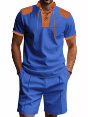 Men's sapphire blue two-piece set with lace-up detail and tan accents.