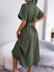 Army green button-down midi dress with short sleeves and tie belt.