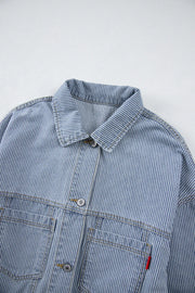 Light pinstripe denim trucker jacket with button front and chest pockets.