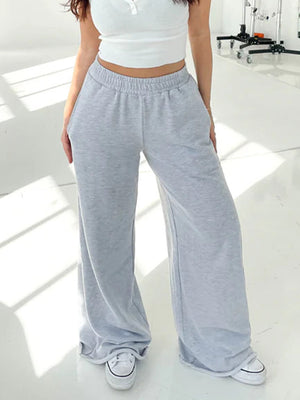 Light gray wide-leg lounge pants with elastic waistband and pockets.