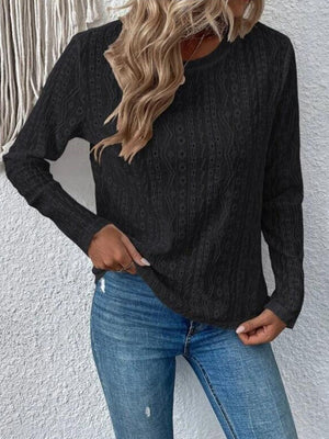 Black geometric eyelet long sleeve knit top with crewneck