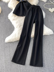 Black belted two-piece set with wide-leg pants and pockets.
