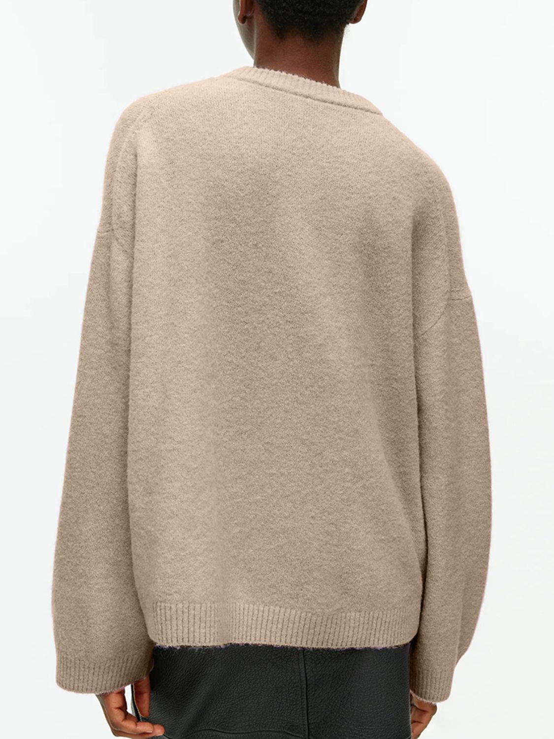 Oversized brushed knit crewneck sweater in Tan with ribbed cuffs and hem.