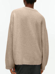 Oversized brushed knit crewneck sweater in Tan with ribbed cuffs and hem.