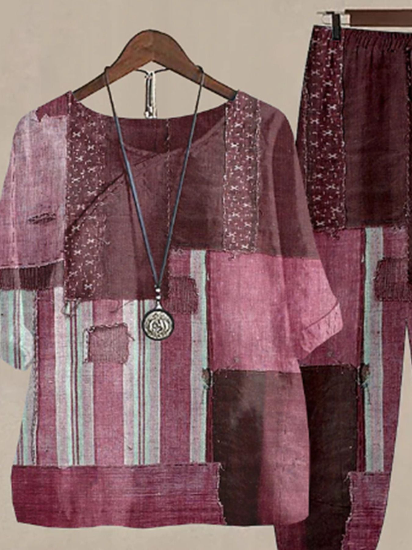 Patchwork floral print half sleeve top and pants set in plum purple and multicolor.