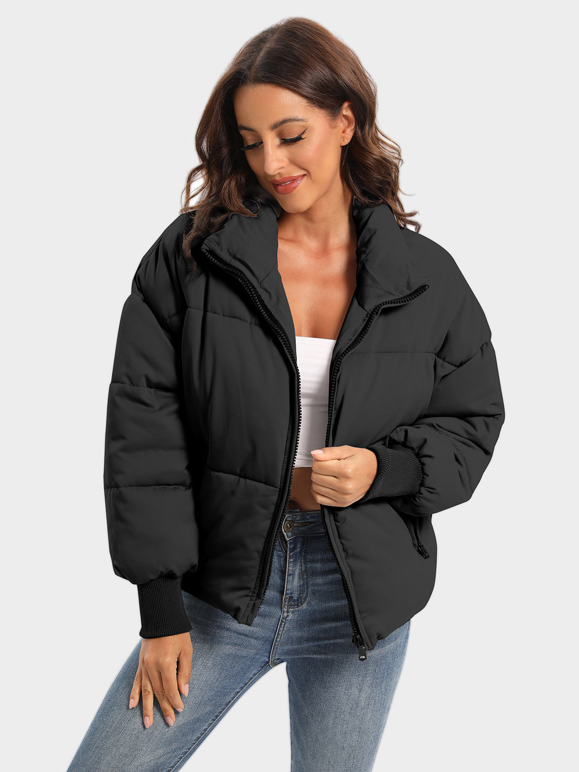 Black padded bomber jacket with ribbed cuffs and a high collar.