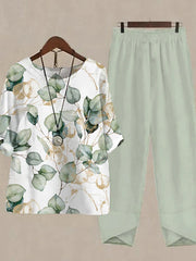 Floral print half sleeve top with elastic waist pants in Gum Leaf green.