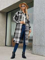 Oversized plaid shirt jacket dress in black and white, featuring button front and pockets.