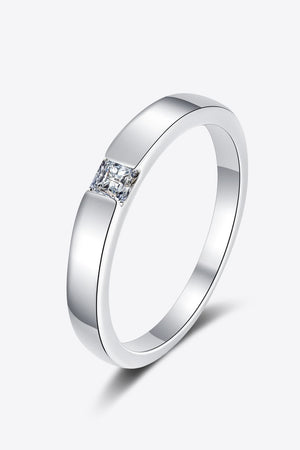 Silver band ring with a square-cut solitaire diamond accent.