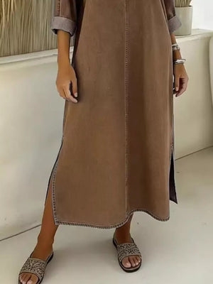 Dark brown midi dress with V-neck, short sleeves, and a thigh-high slit.