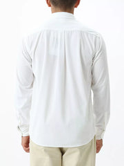 White long sleeve buttoned shirt with back pleats and cuffed sleeves.