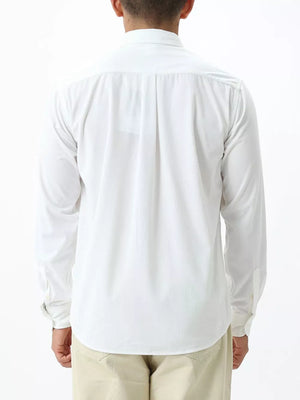 White long sleeve buttoned shirt with back pleats and cuffed sleeves.