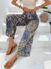 Paisley palazzo trousers in multicolor with drawstring waist, wide leg, and cropped length.