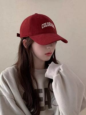 Burgundy cotton baseball cap with embroidered Colorado text.