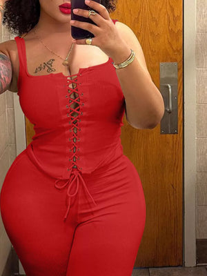 Scarlet lace-up tank top and capri pants set with drawstring detail.