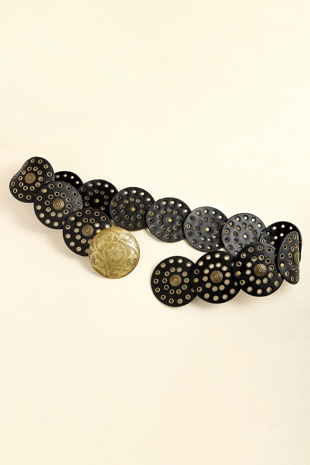 Black leather belt with multiple round silver-tone disc embellishments and a decorative gold-tone buckle.