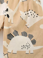 Toddler beige cotton two-piece outfit with a fun dinosaur print.