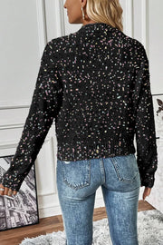 Black confetti knit button-up cardigan with colorful speckles.