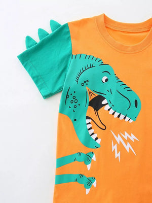 Orange cotton tee with green dinosaur graphic and spike details on sleeves.