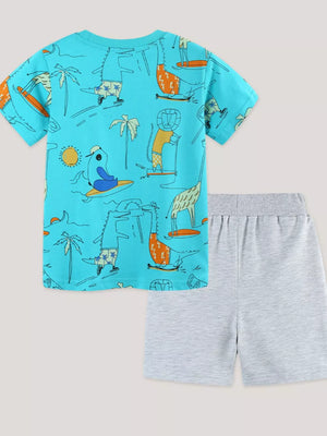 Boys' blue cotton t-shirt with animal surfing and skateboarding print, paired with grey shorts.