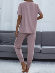 Lilac relaxed-fit tee and jogger lounge set with short sleeves and cuffed ankles.