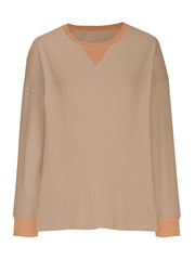 Tan waffle knit raglan sleeve sweatshirt with contrast neckline and cuffs