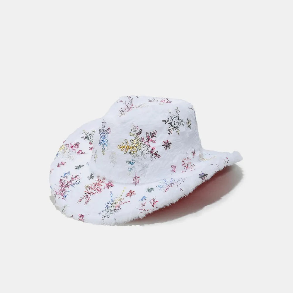 White faux fur cowboy hat with colorful snowflake pattern