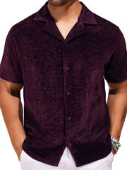 Textured velour camp collar shirt in plum purple with button front.