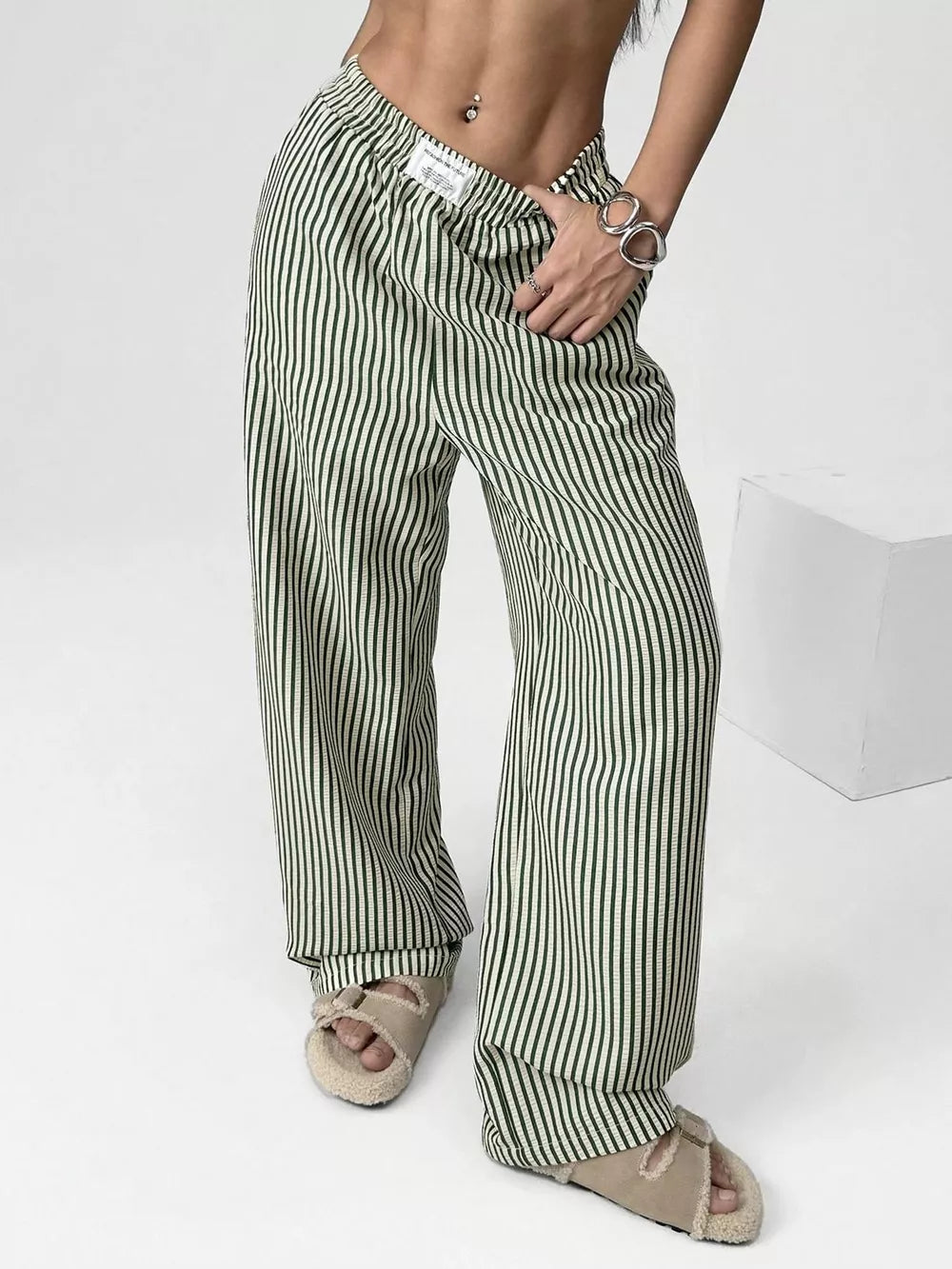 Green striped high-waisted wide-leg pants with drawstring detail