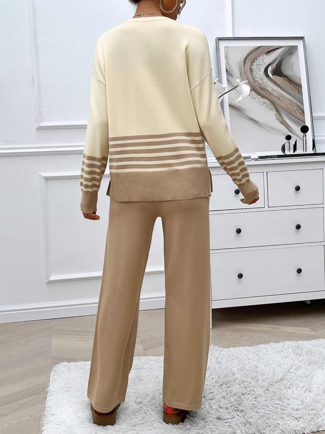 Color-blocked knit lounge set in tan with brown stripes, acrylic material, crew neck sweater and wide leg pants.