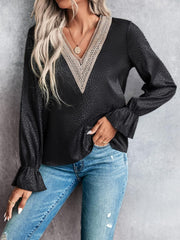 Black satin blouse with lace V-neck inset and ruffle cuffs