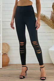 Black performance leggings with distressed knee slits and a high waist.