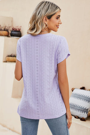 Lavender eyelet sleeve detail V-neck top with short sleeves and a casual fit.