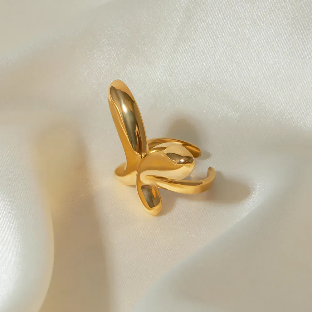 Gold butterfly ring with sculpted wings, 18K gold-plated.
