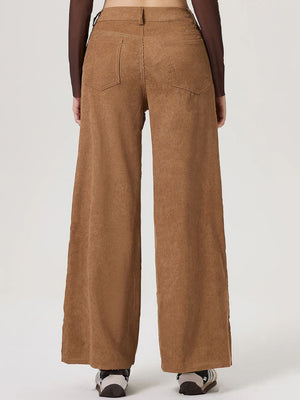 Camel corduroy wide-leg trousers with buttoned waist and back pockets.