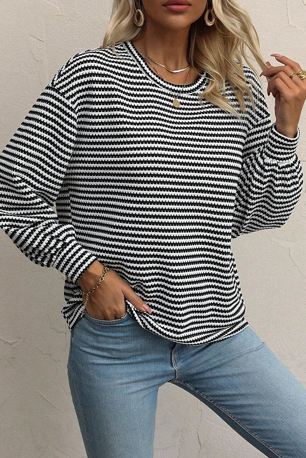 Black and white striped long sleeve tee with crew neck