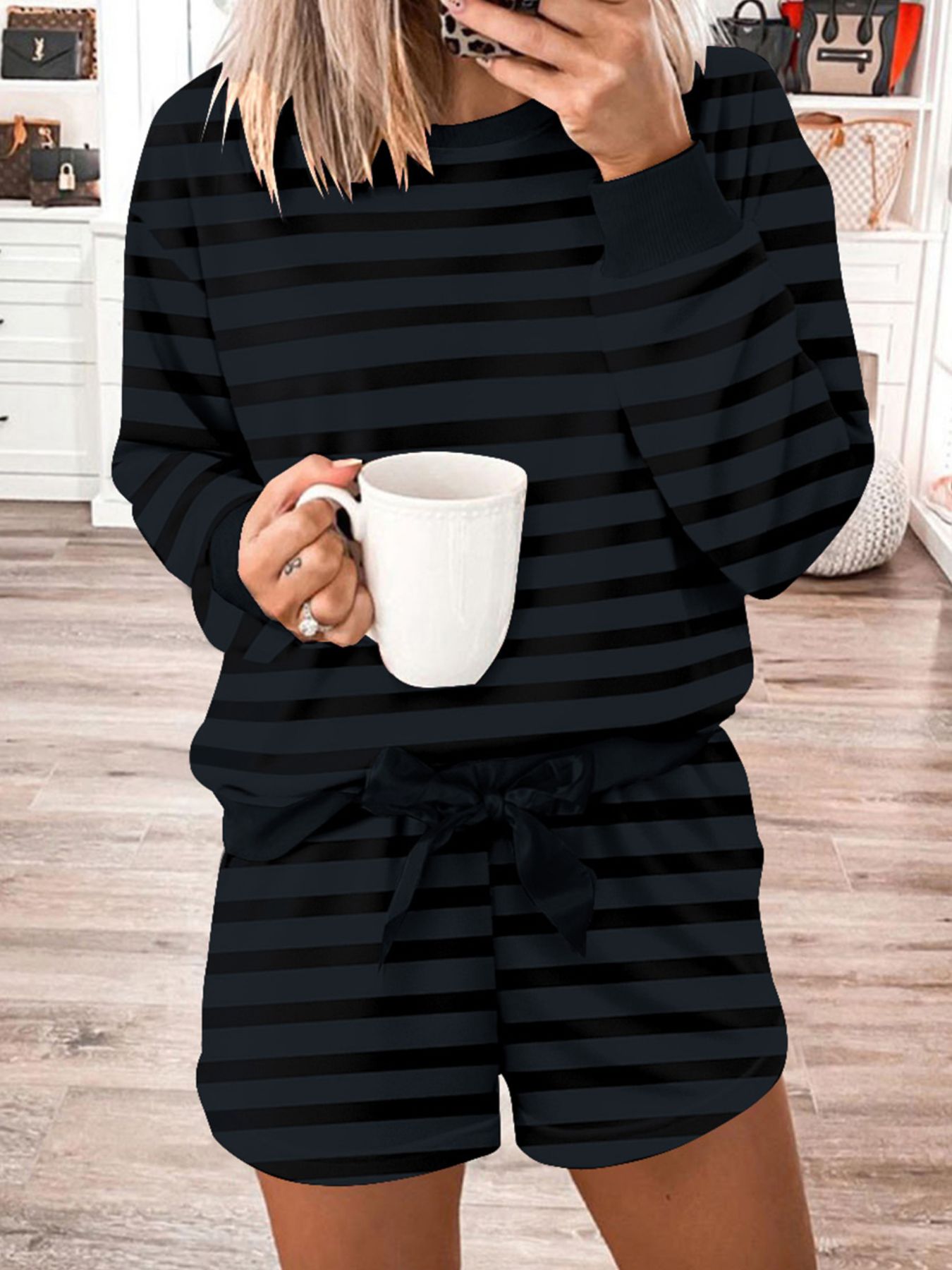 Dark gray striped pajama set with crew neck top and tie-waist shorts.
