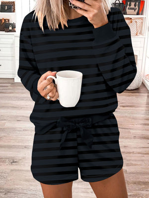 Dark gray striped pajama set with crew neck top and tie-waist shorts.