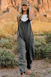 Gray cotton V-neck wide-leg jumpsuit with pockets and a comfortable fit.