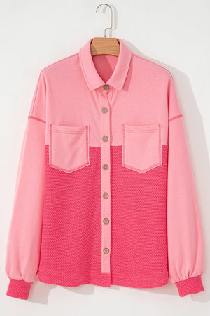 Blush pink waffle knit panel shacket with button front and chest pockets.